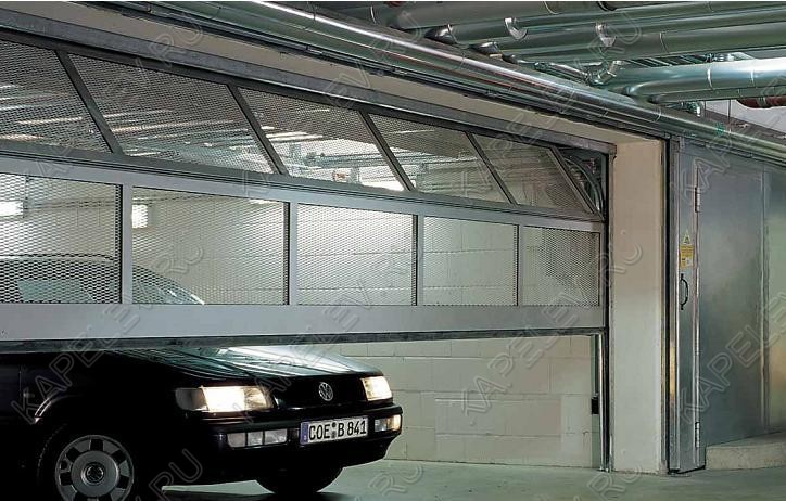 Секционные ворота SPU F42 для подземного паркинга с вентиляционными вставками применяются для разделения зон внутри паркинга